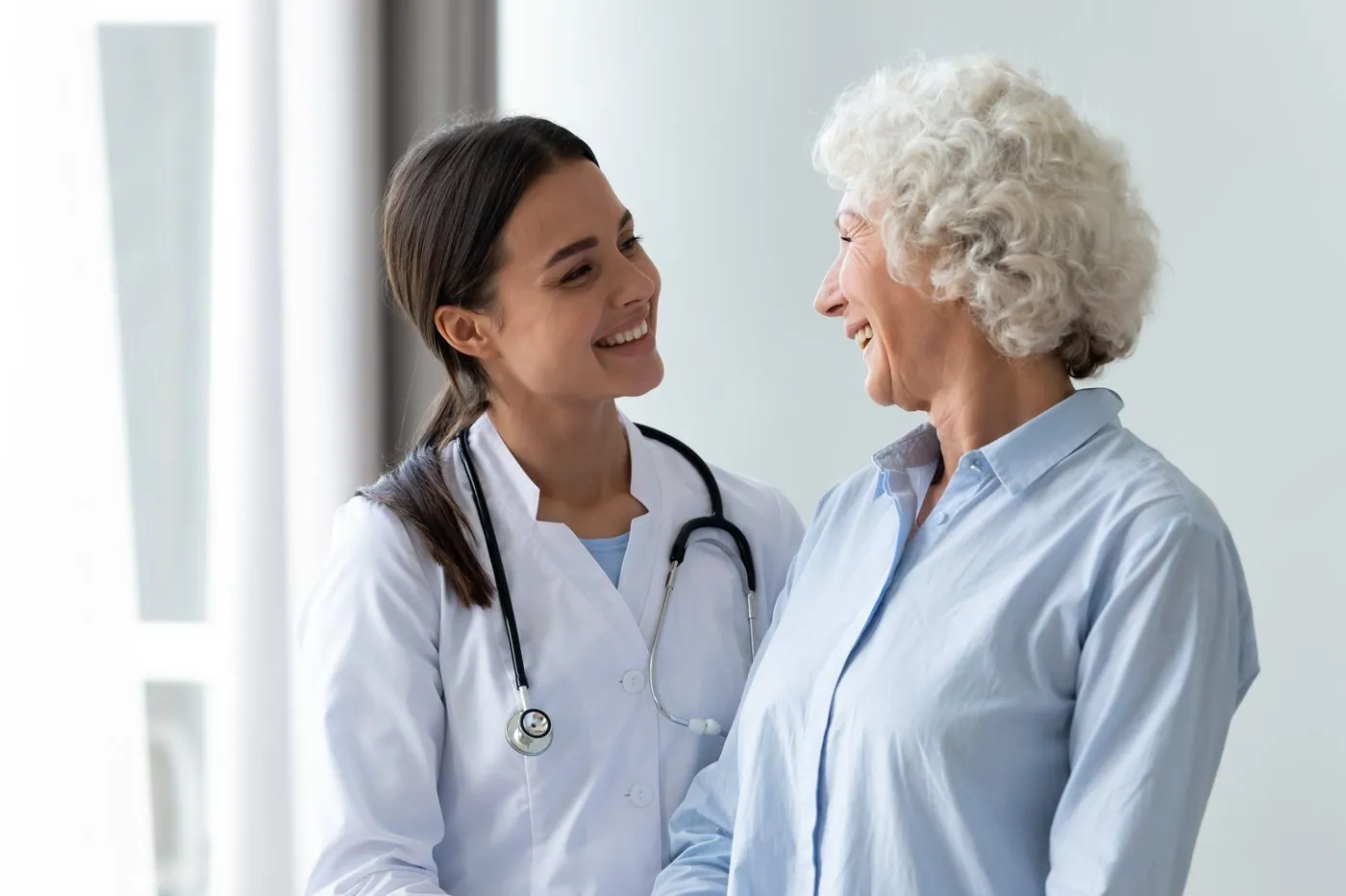A doctor with a patient at a South African healthcare practice